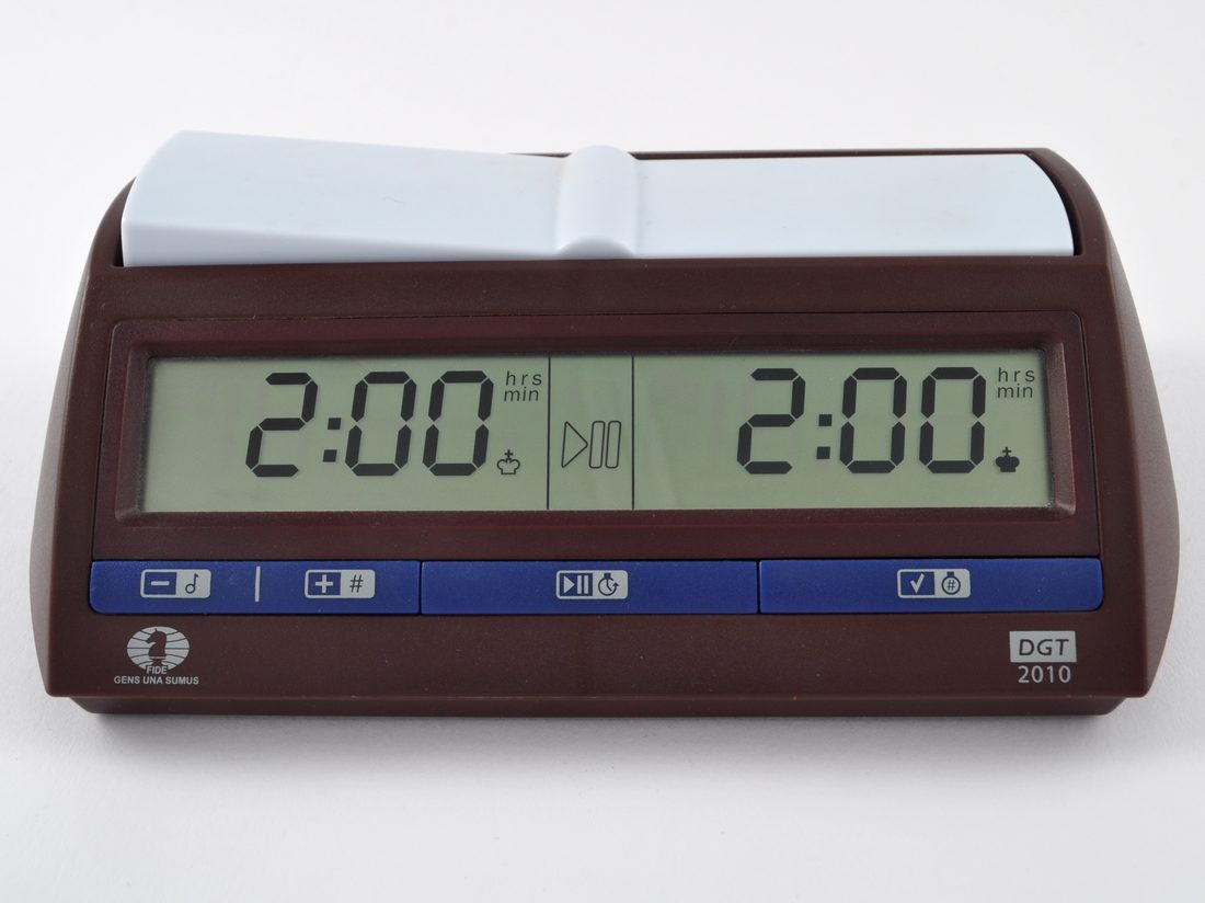 A digital chess clock, a symbol of time running out on both players at once